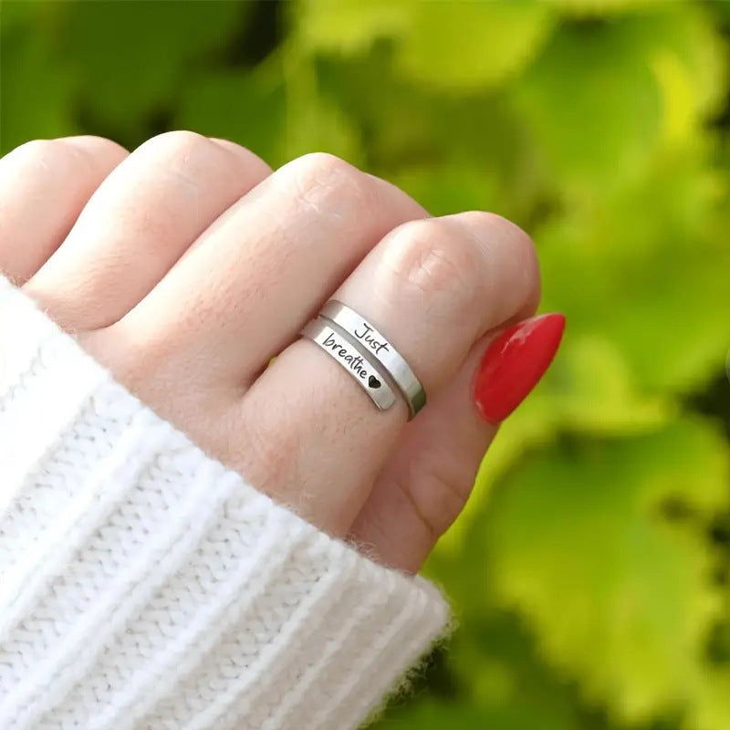 Spiral heart shaped ring