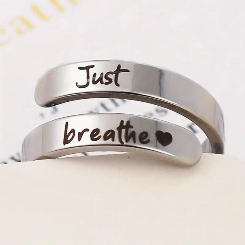 Spiral heart shaped ring