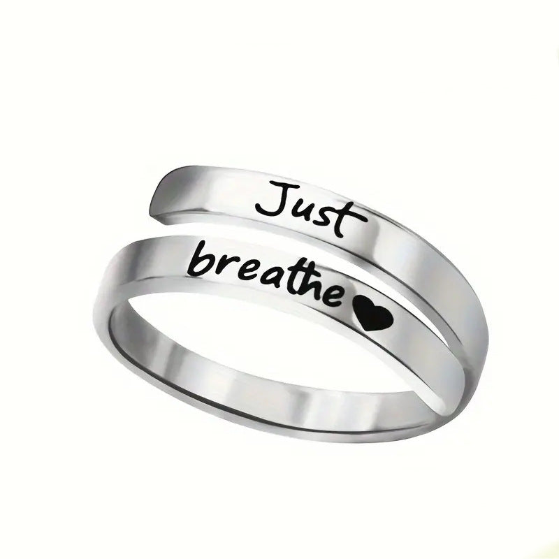 Spiral heart shaped ring